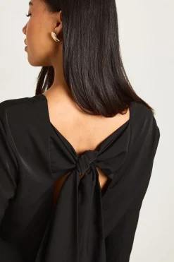 Mini robe à dos ouvert avec détail de petit nœud