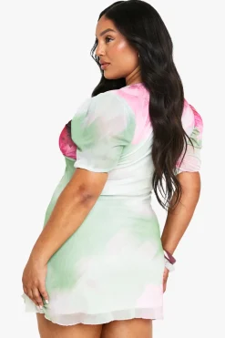 Mini-robe en mesh floral à manches bouffantes