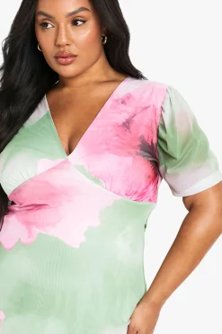 Mini-robe en mesh floral à manches bouffantes
