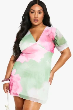 Mini-robe en mesh floral à manches bouffantes