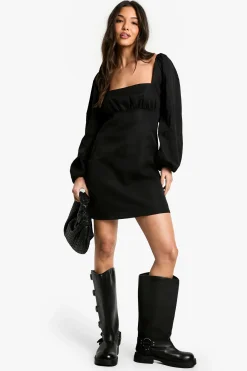 Mini robe à manches bouffantes longues