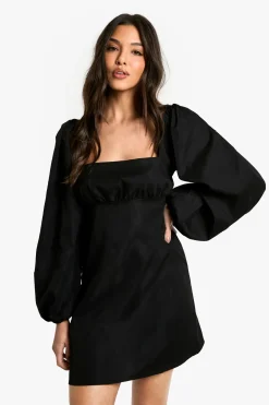 Mini robe à manches bouffantes longues