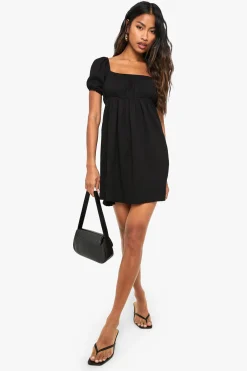 Mini robe smock à manches bouffantes