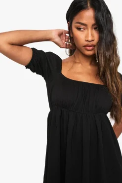 Mini robe smock à manches bouffantes