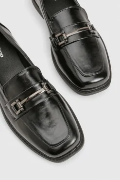 Mocassins coupe large avec détails en quincaillerie