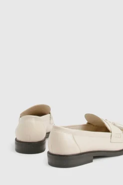 Mocassins froncés à pompons
