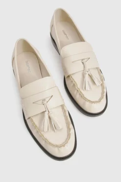 Mocassins froncés à pompons