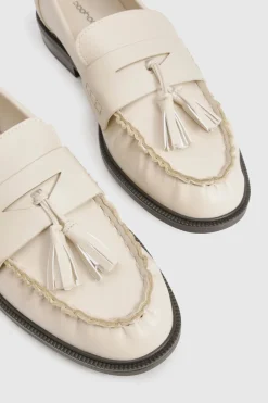 Mocassins froncés à pompons