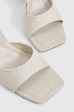 Mules en lin rembourrées à talon mi-haut façon chaussette