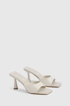 Mules en lin rembourrées à talon mi-haut façon chaussette