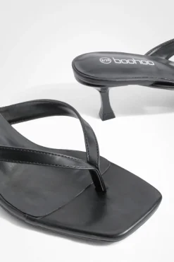 Mules à talon bas, bout carré et bride à lanière