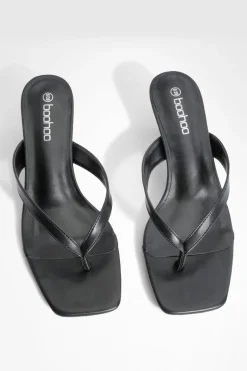 Mules à talon bas, bout carré et bride à lanière