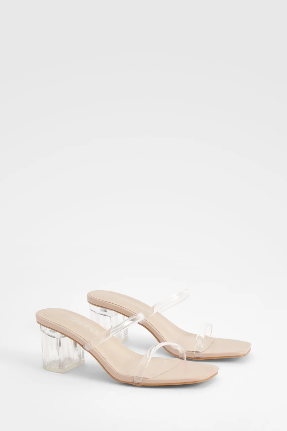 Mules à talon bloc bas transparent à coupe large
