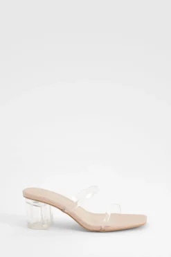 Mules à talon bloc bas transparent à coupe large