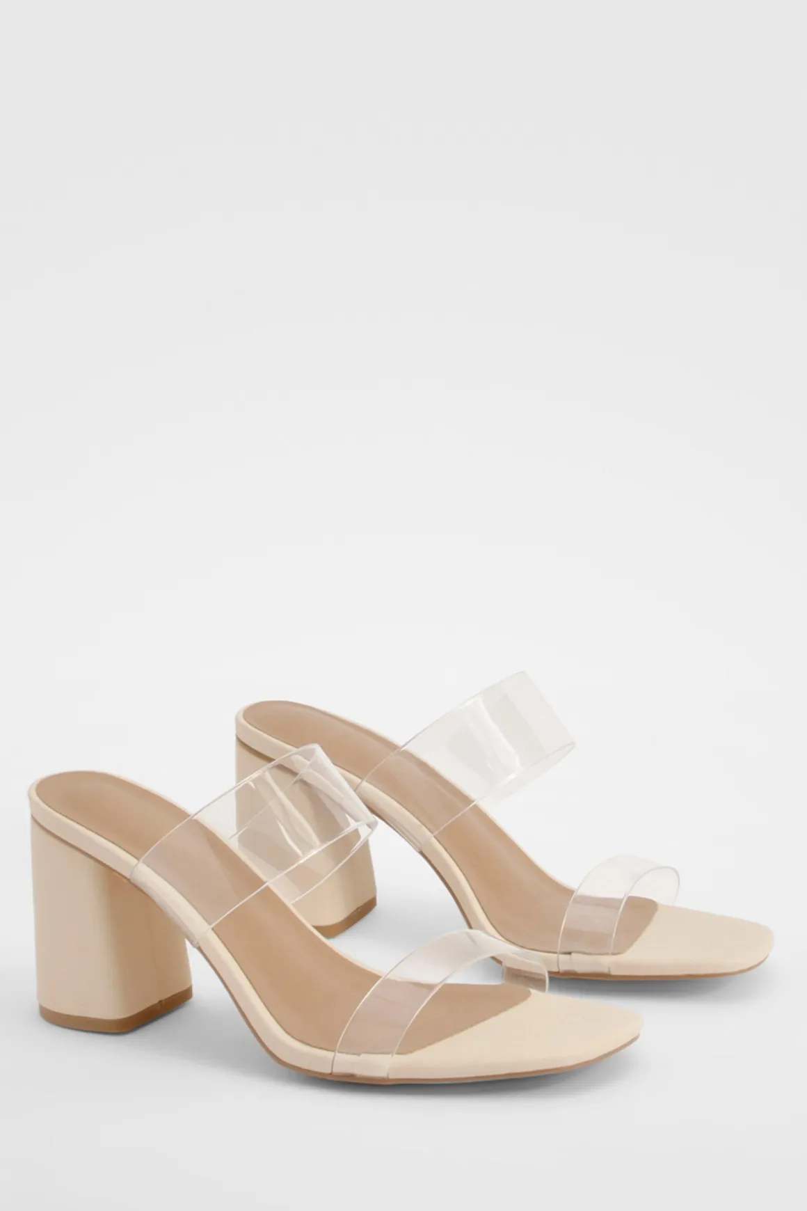 Mules à talon bloc, double bride transparente, coupe large