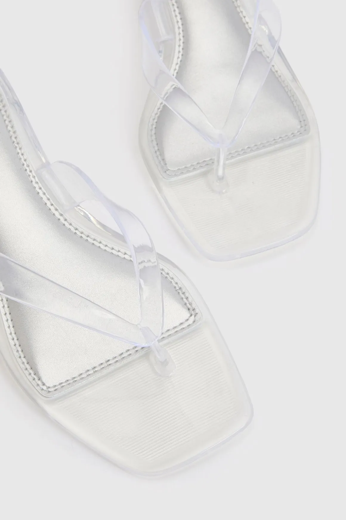 Mules À Talons Bas En Gelée Transparente Avec Bride Entre Les Orteils