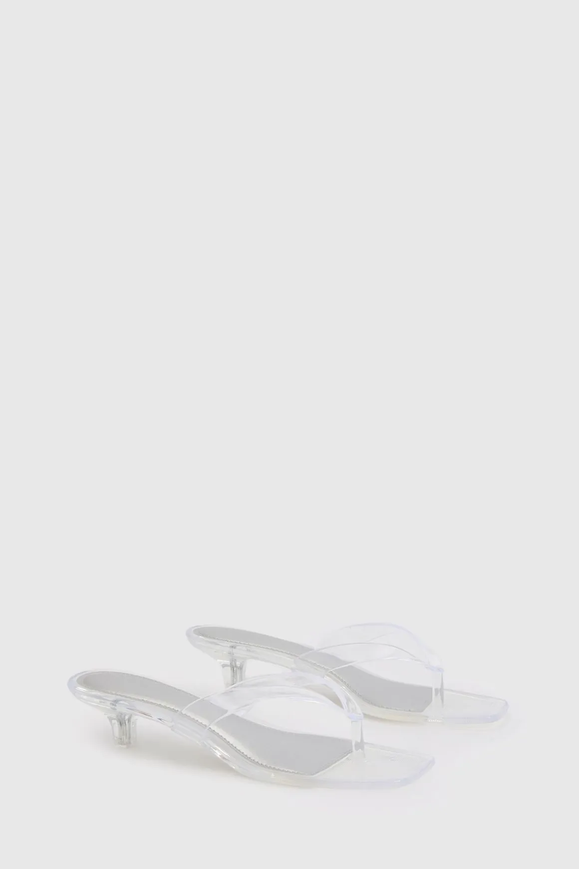 Mules À Talons Bas En Gelée Transparente Avec Bride Entre Les Orteils