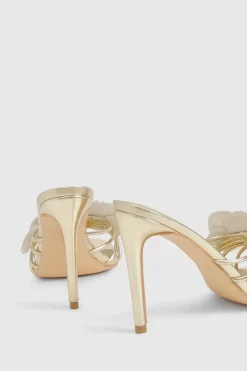 Mules à talons à détails floraux et coupe large
