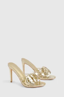 Mules à talons à détails floraux et coupe large