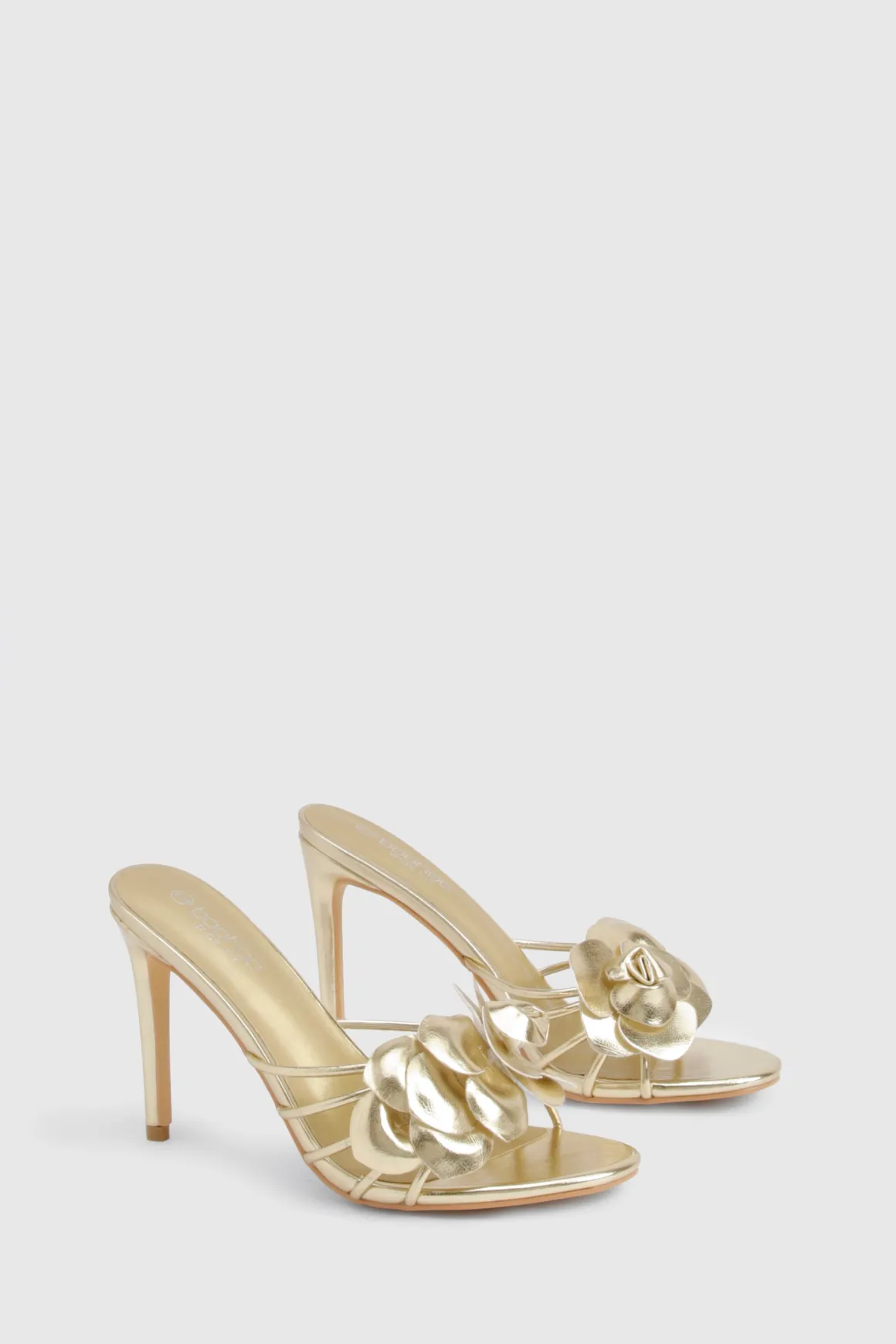 Mules à talons à détails floraux et coupe large