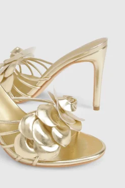 Mules à talons à détails floraux et coupe large