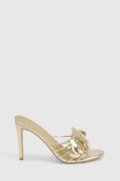 Mules à talons à détails floraux et coupe large