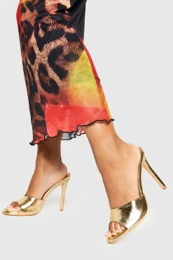 Mules à talons métalliques