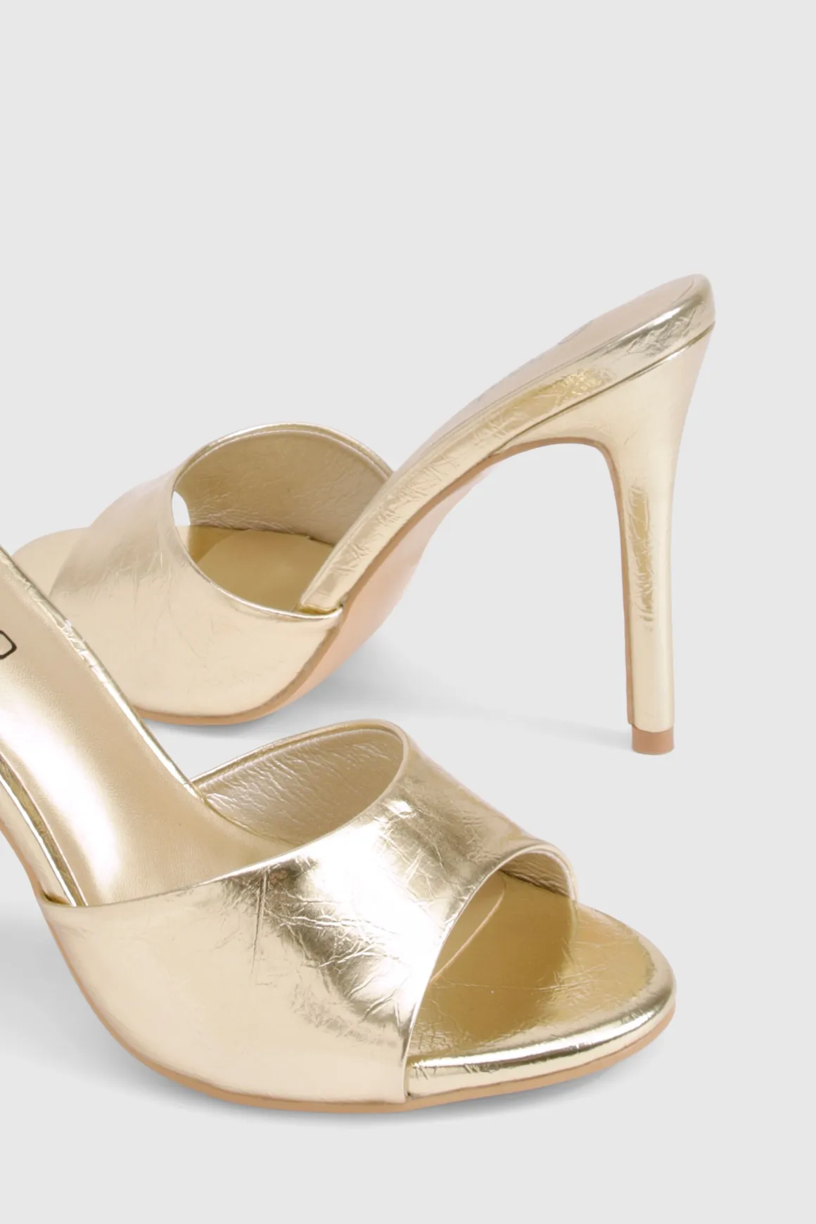Mules à talons métalliques