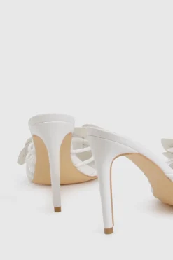 Mules à talons pour pieds larges avec détails floraux