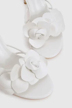 Mules à talons pour pieds larges avec détails floraux