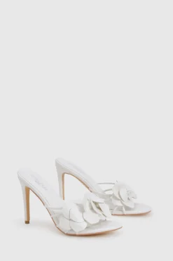 Mules à talons pour pieds larges avec détails floraux