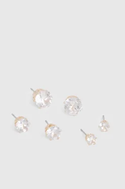 boohoo Pack de 3 boucles d’oreilles clous Diamante en or< Boucles D'Oreilles