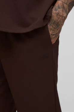 Pantalon allongé en sergé scuba fuselé