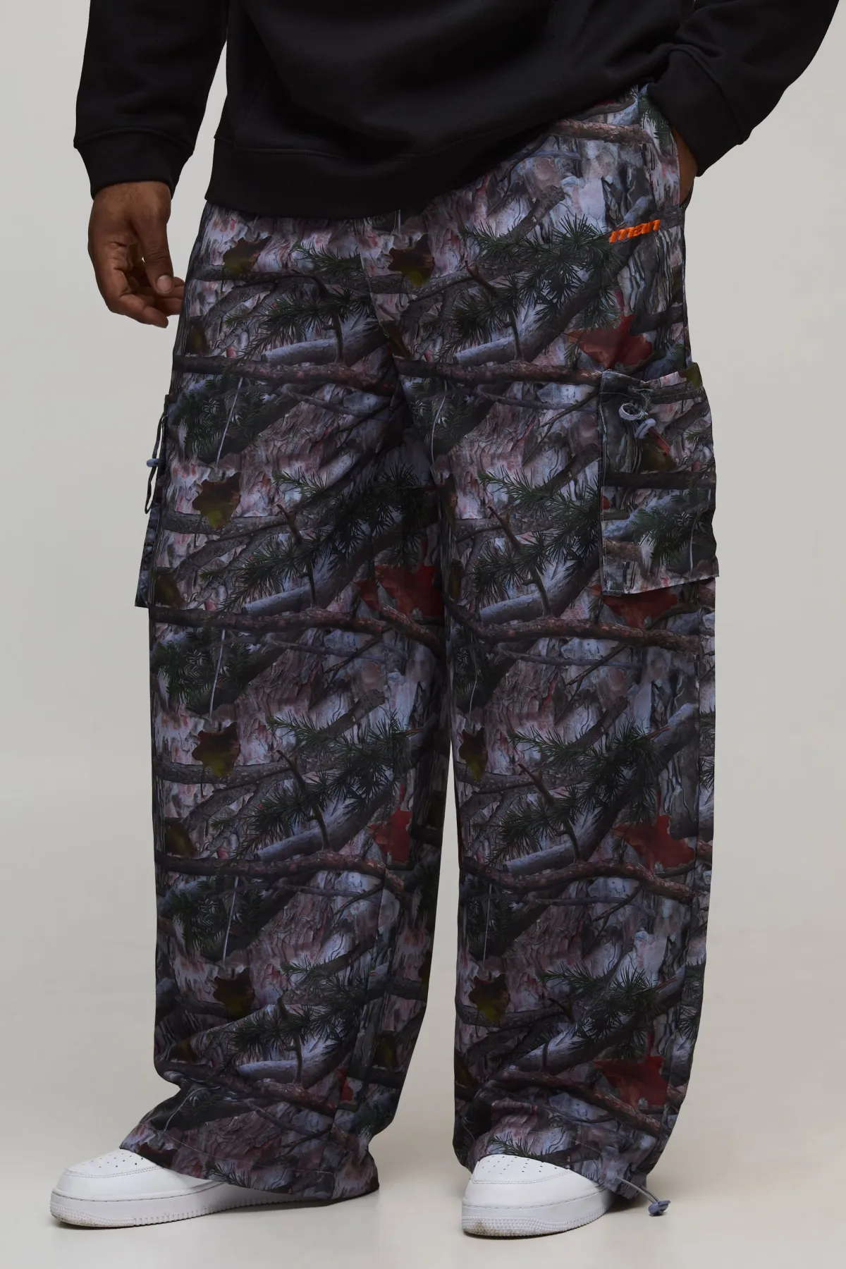 boohooMAN Pantalon ample camouflage en nylon à ceinture élastiquée<Homme Tout Afficher|Pantalons Grande Taille