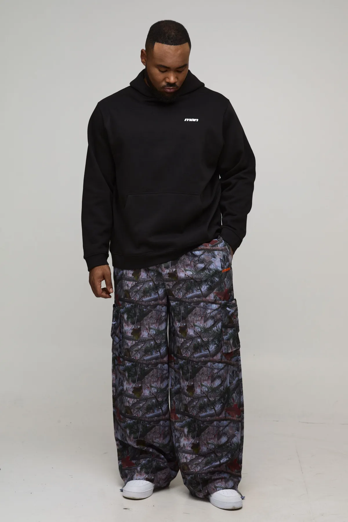boohooMAN Pantalon ample camouflage en nylon à ceinture élastiquée<Homme Tout Afficher|Pantalons Grande Taille