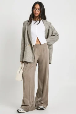 Pantalon ample à plis extrêmes