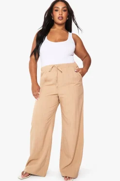 Pantalon ample à rayures fines, sur-mesure et taille élastiquée