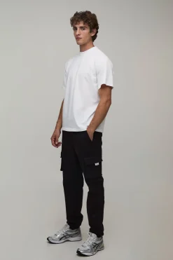 Pantalon cargo slim fit à taille élastiquée, patte tissée et revers aux chevilles