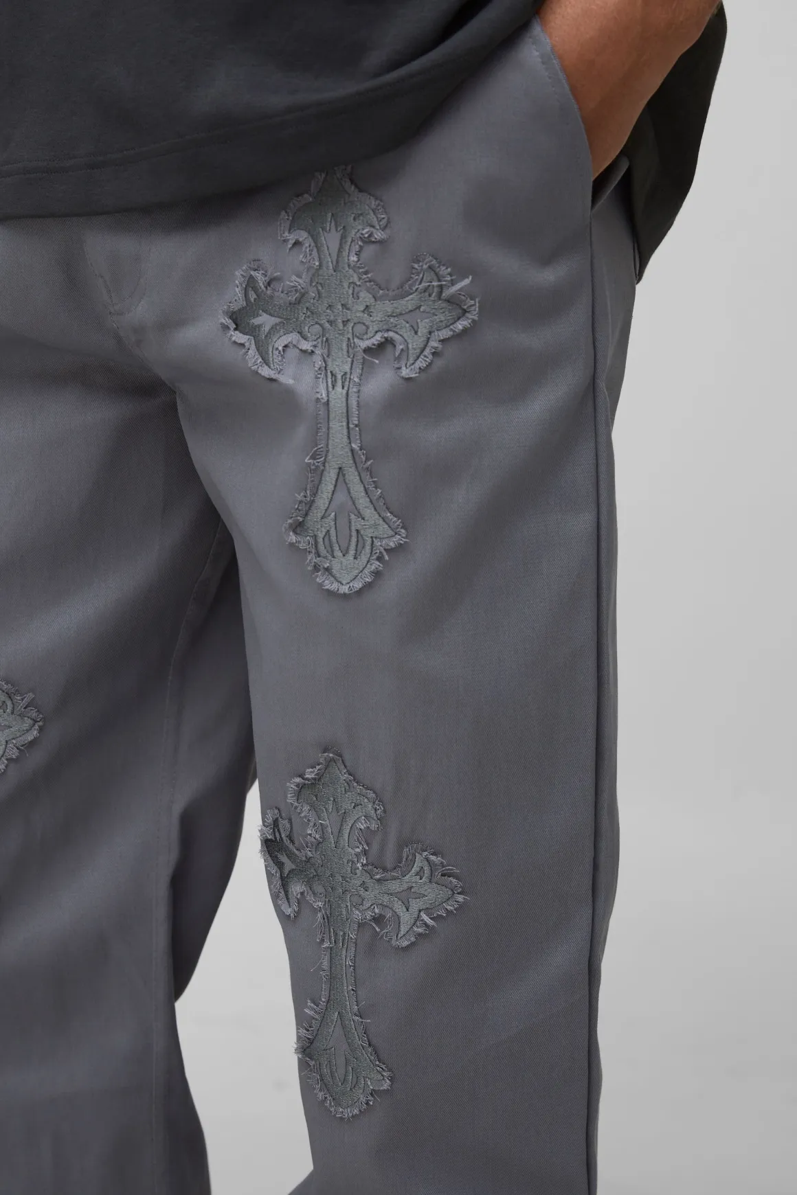 Pantalon décontracté long à taille fixe et appliqué croisé