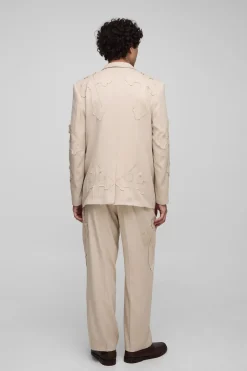 Pantalon de costume à coupe décontractée avec appliqué croisé