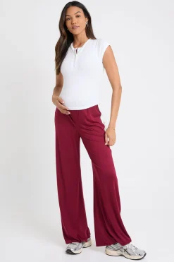 Pantalon de maternité à jambes larges avec bande latérale contrastante