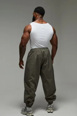 Training Dept. Pantalon de Sport Tissé Training Dept<Homme Nouveautés Grande Taille|Tout Afficher