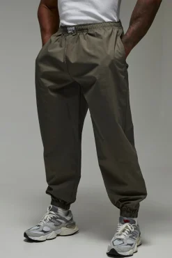 Training Dept. Pantalon de Sport Tissé Training Dept<Homme Nouveautés Grande Taille|Tout Afficher