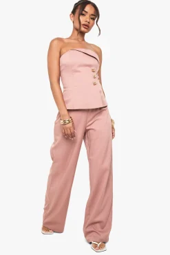 Pantalon droit à garniture dorée