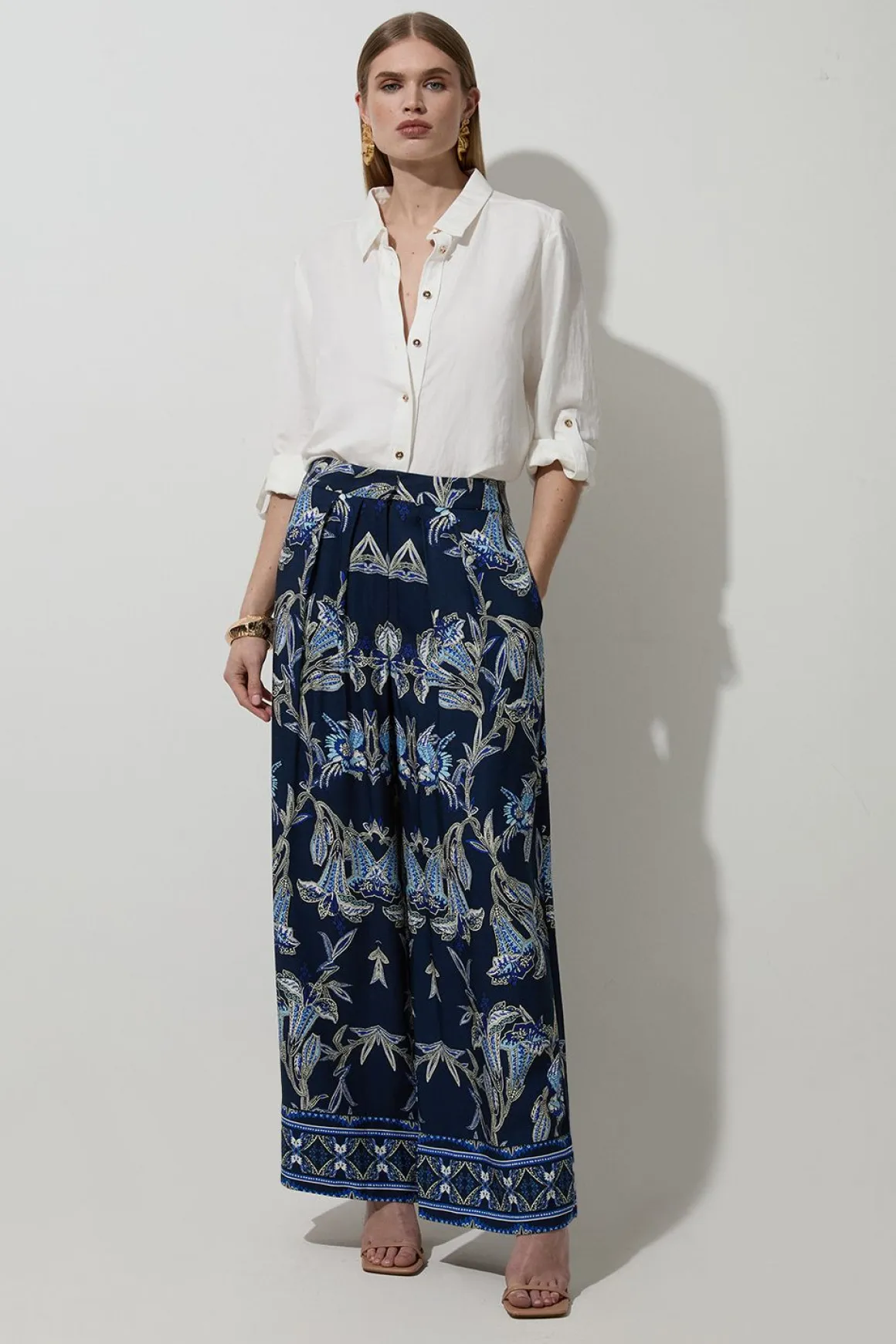 Pantalon droit tissé en viscose et lin à imprimé floral miroitant