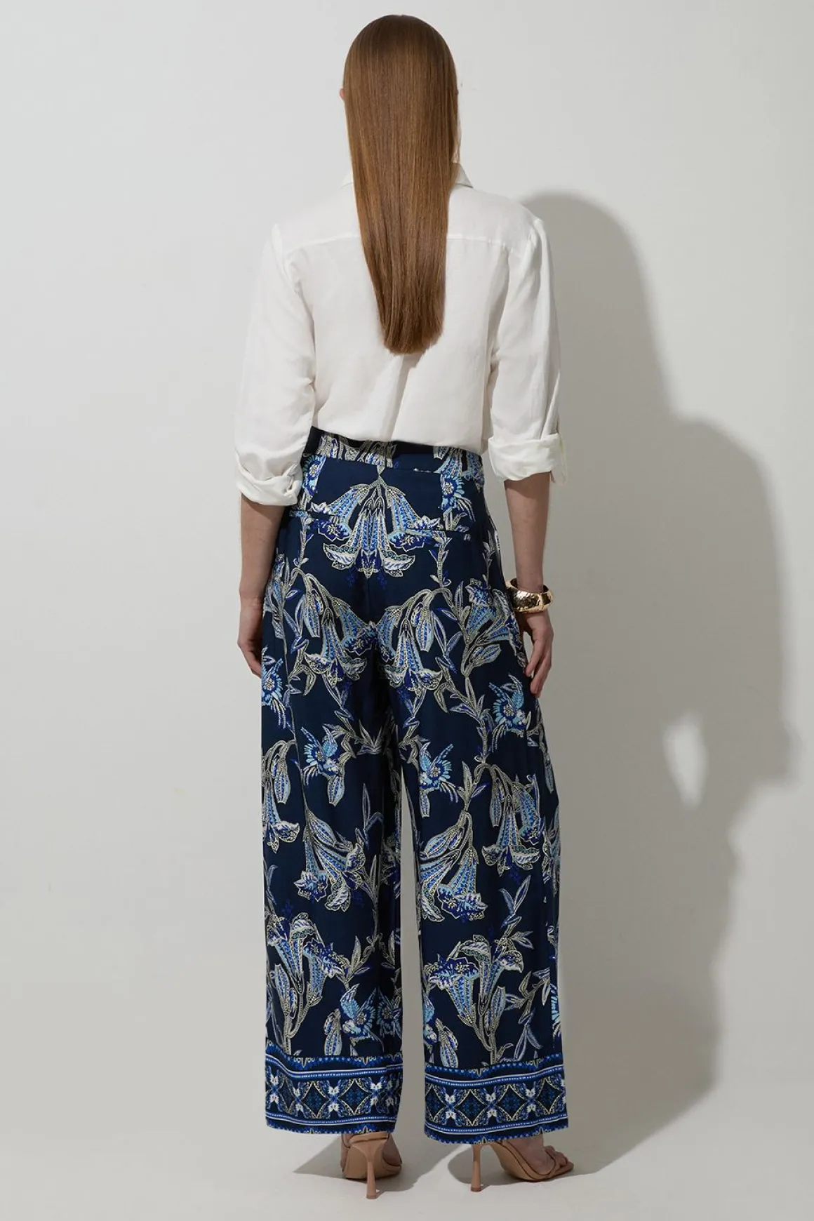 Pantalon droit tissé en viscose et lin à imprimé floral miroitant