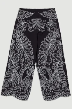 Pantalon en lin à broderie découpée tissée
