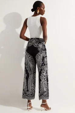 Pantalon en lin à broderie découpée tissée