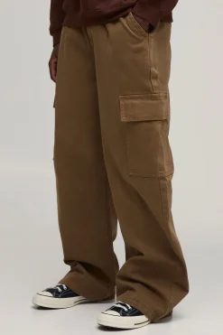 Pantalon en sergé lavé à coupe ample, avec ceinture moitié-moitié et poche cargo