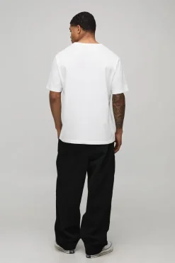 Pantalon en sergé lavé à coupe ballon et ceinture bicolore
